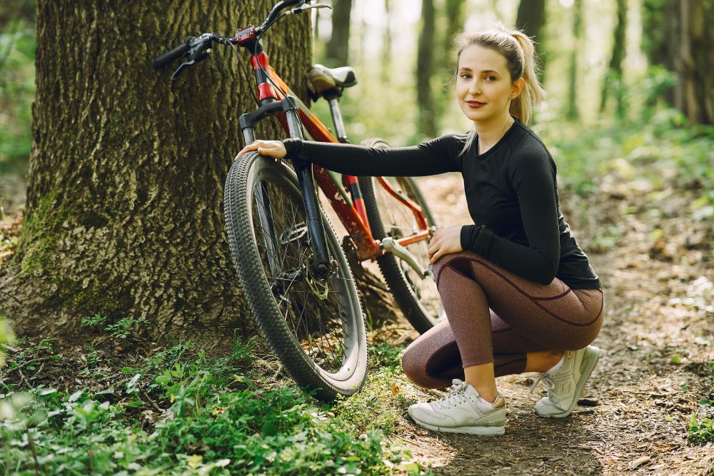 woman-riding-mountain-bike-forest (3).jpg