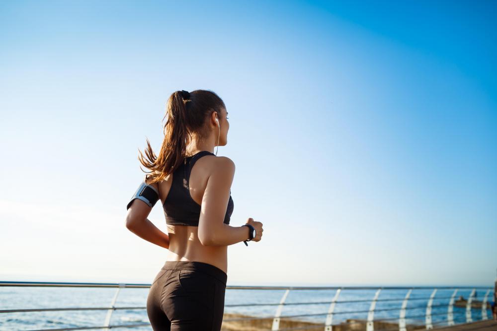 picture-young-attractive-fitness-woman-jogging-with-sea-wall.jpg